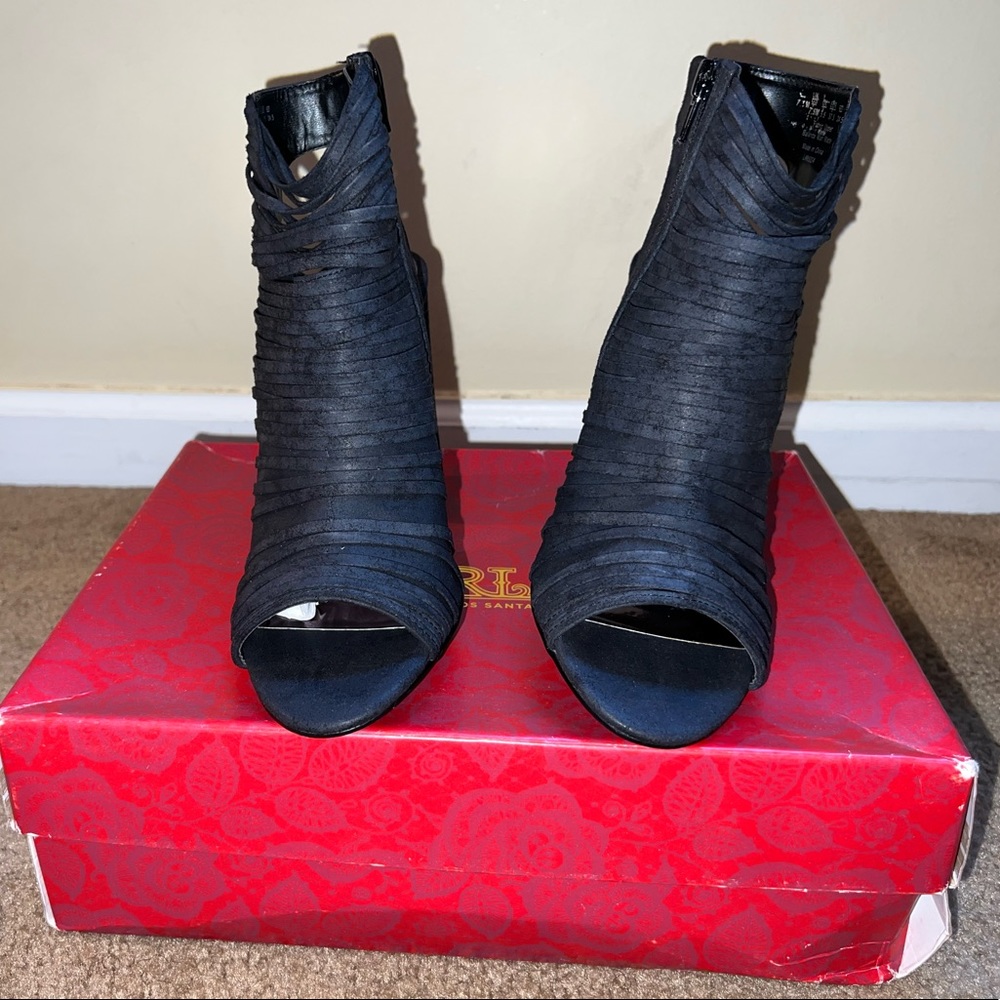 Carlos Santana Larissa Bootie